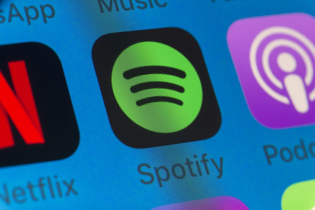 Spotify, Podcasts, Netflix and other cellphone Apps on iPhone screen